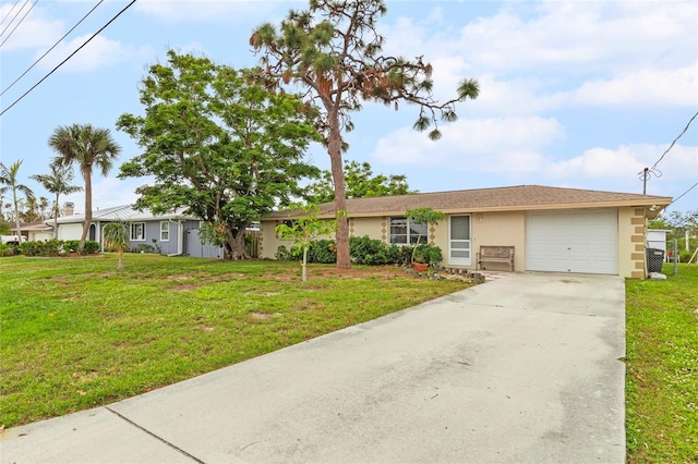 single story home featuring a front yard and a garage