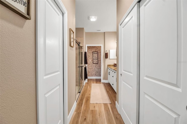 hall featuring light hardwood / wood-style flooring