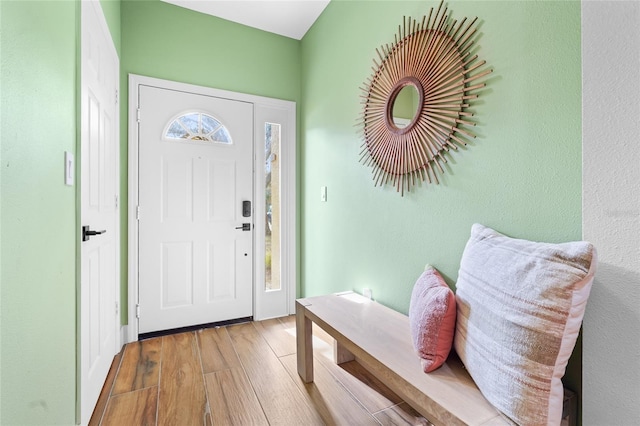 entryway with light hardwood / wood-style flooring