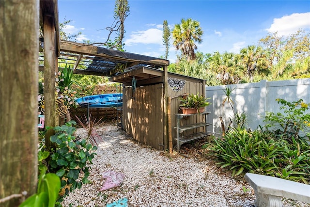 exterior space with a pool