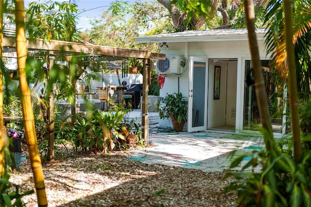 view of outbuilding with ac unit