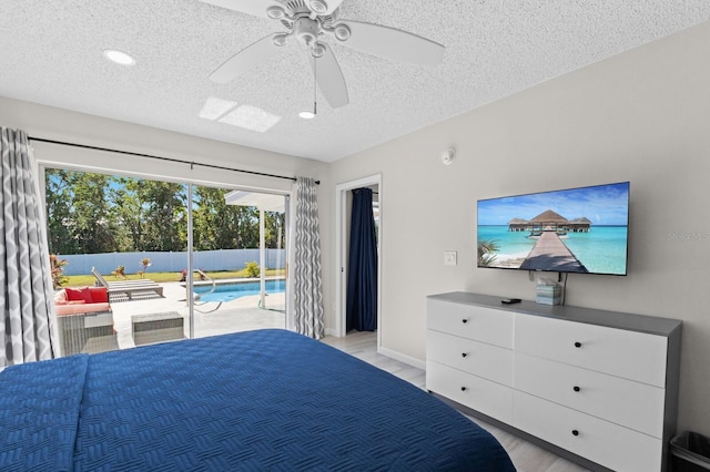 bedroom featuring access to outside, ceiling fan, a textured ceiling, and light wood-type flooring