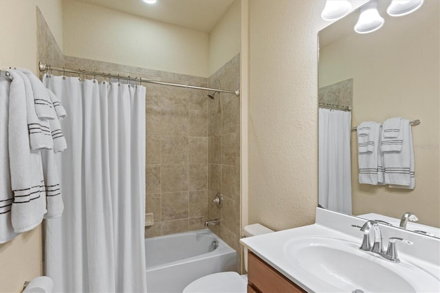 full bathroom featuring toilet, shower / tub combo, and vanity