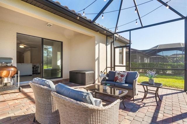 view of patio featuring a lanai and an outdoor hangout area