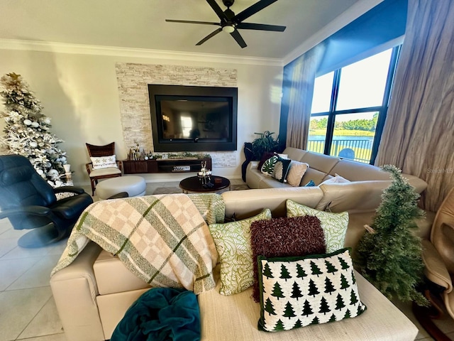 living room featuring light tile patterned floors, ceiling fan, and crown molding