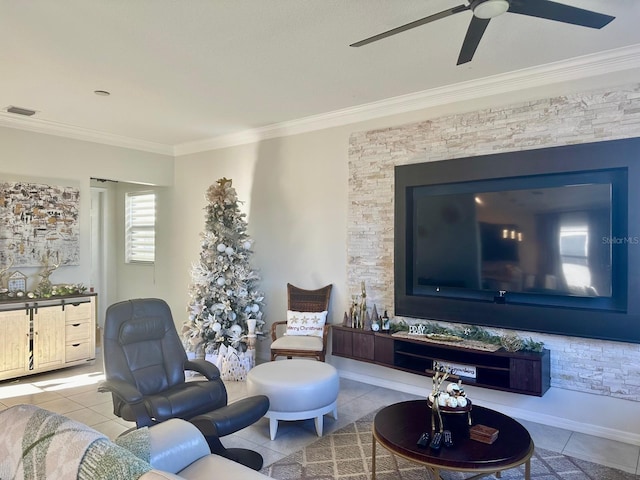 living area featuring crown molding and light tile patterned flooring