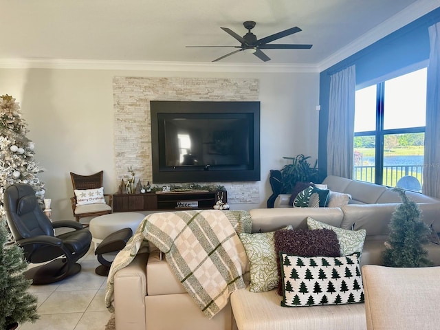 tiled living room featuring ceiling fan and ornamental molding