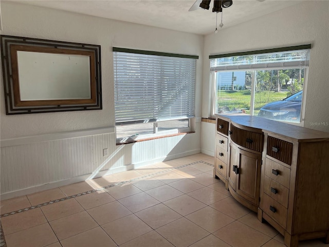 bathroom with tile patterned floors and ceiling fan