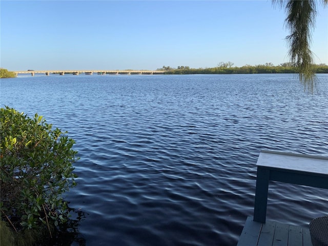 view of dock with a water view