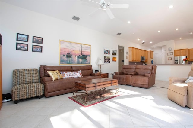 living room featuring ceiling fan and light tile patterned flooring