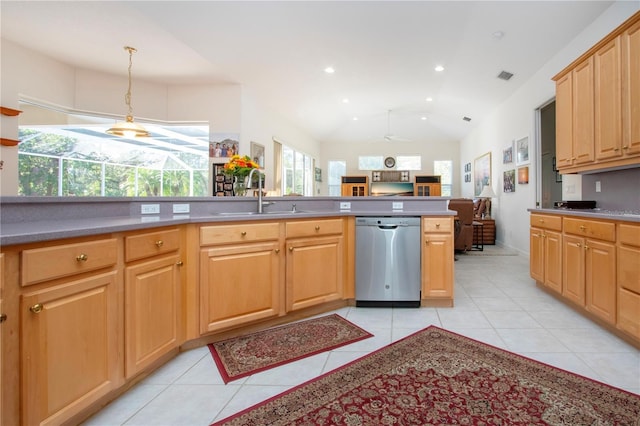 kitchen featuring ceiling fan, sink, stainless steel dishwasher, vaulted ceiling, and light tile patterned flooring