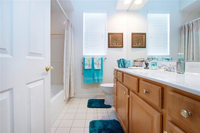 full bathroom featuring tile patterned flooring, vanity, shower / bath combination with curtain, and toilet