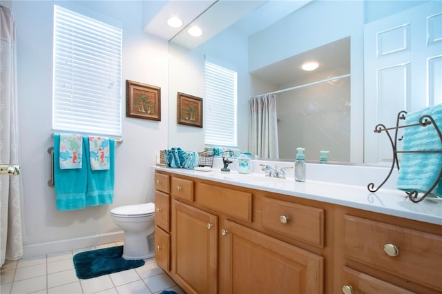 bathroom featuring tile patterned flooring, vanity, toilet, and a shower with shower curtain