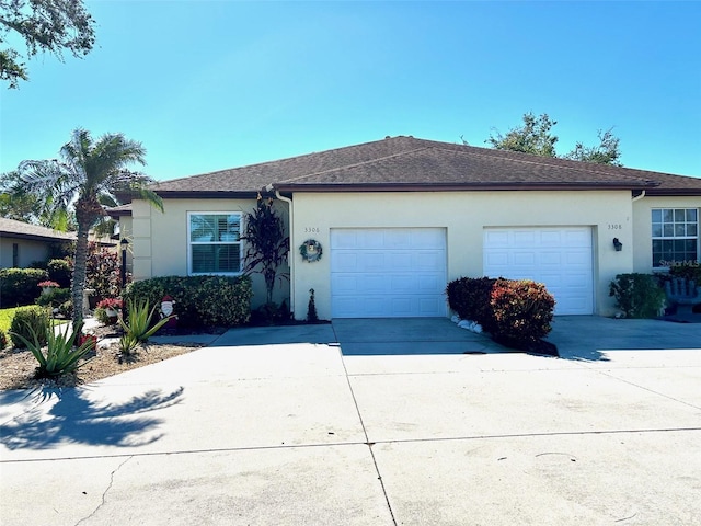 single story home with a garage