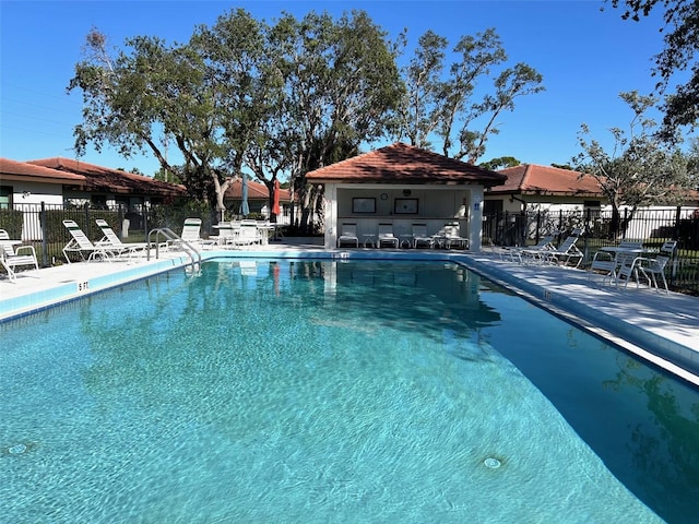 view of pool featuring a patio