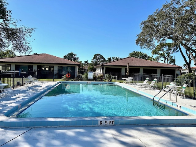 view of swimming pool featuring a patio