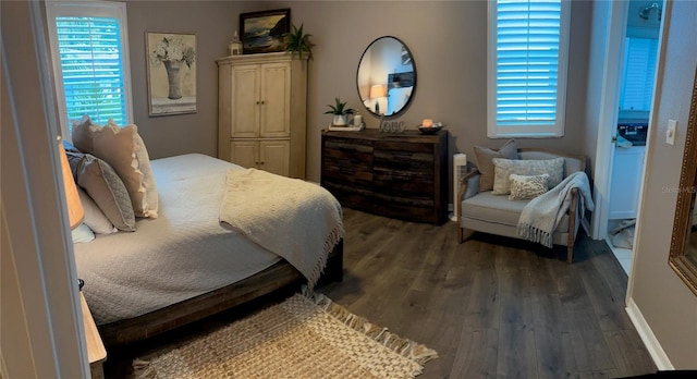 bedroom with wood finished floors