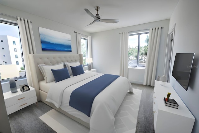 carpeted bedroom with multiple windows and ceiling fan