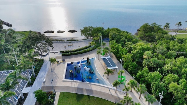 birds eye view of property featuring a water view