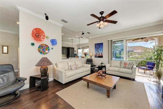 living room with dark hardwood / wood-style floors, ceiling fan, and crown molding