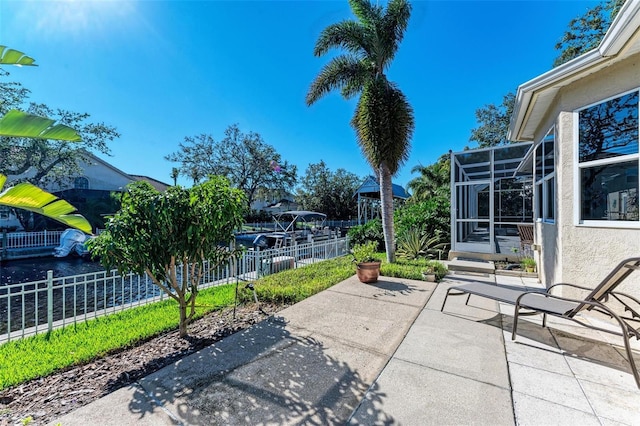 view of patio with a lanai