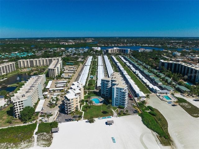 bird's eye view with a water view