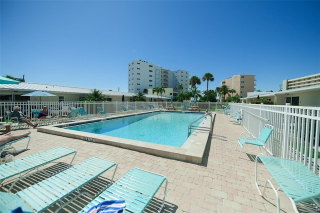 view of pool featuring a patio area