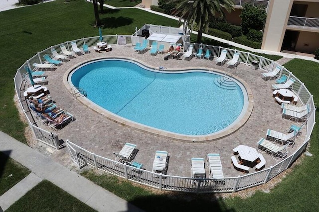 view of pool featuring a patio