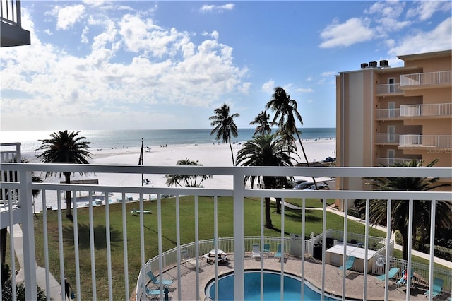 balcony with a view of the beach and a water view