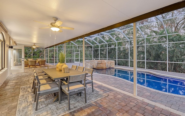 exterior space with a patio, ceiling fan, and a lanai