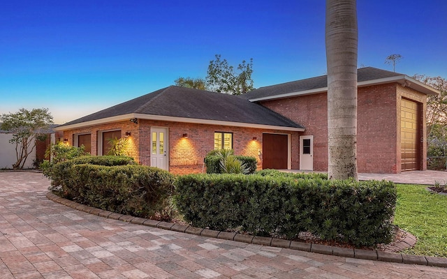 view of front of home with a garage