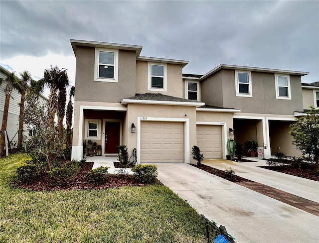 view of front of property with a garage