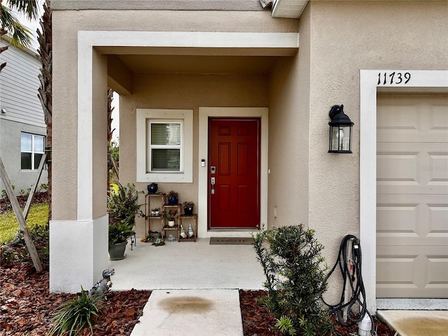 entrance to property with a garage