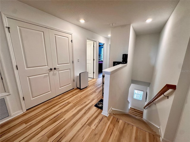 corridor featuring light wood-type flooring