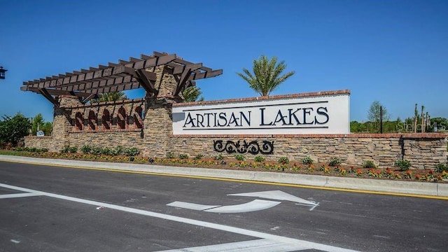 view of community sign