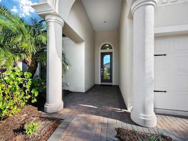 property entrance featuring a garage