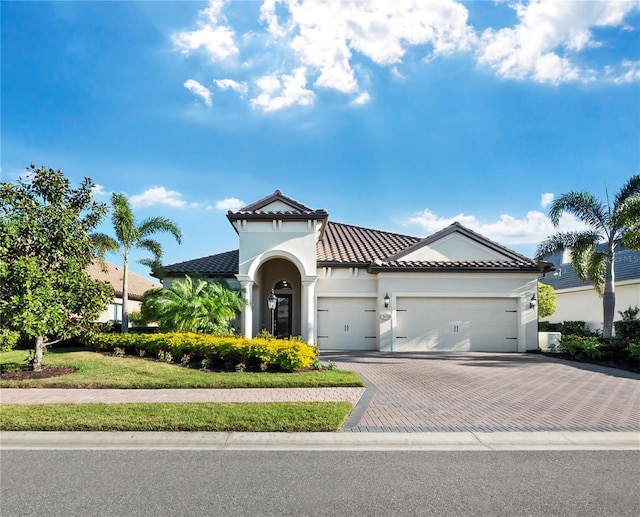 view of front of property featuring a garage