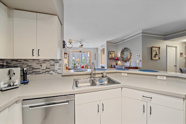 4106 Central Sarasota Pkwy Unit 1026, Sarasota, FL 34238 - kitchen featuring stainless steel dishwasher, a sink, ornamental molding, light countertops, and decorative backsplash