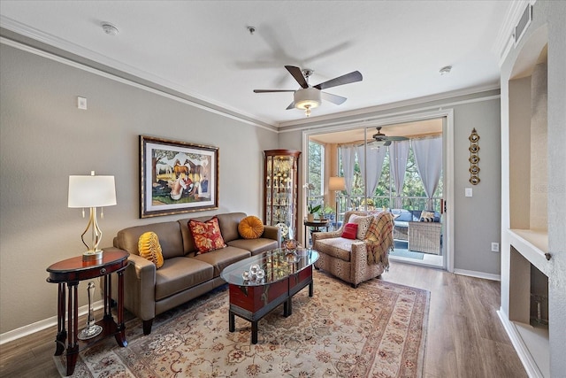 4106 Central Sarasota Pkwy Unit 1026, Sarasota, FL 34238 - living room featuring a ceiling fan, ornamental molding, wood finished floors, and baseboards