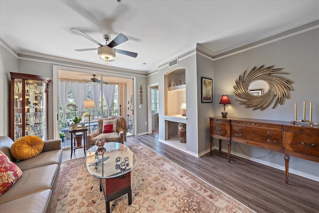 living room featuring ornamental molding and dark wood-type flooring