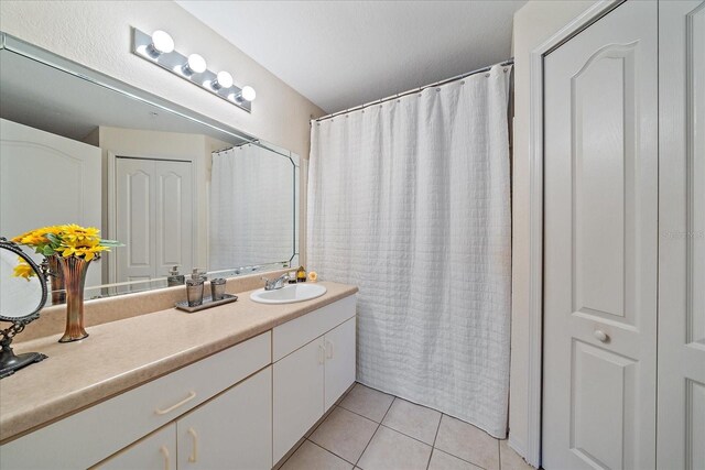 4106 Central Sarasota Pkwy Unit 1026, Sarasota, FL 34238 - full bathroom featuring tile patterned flooring and vanity