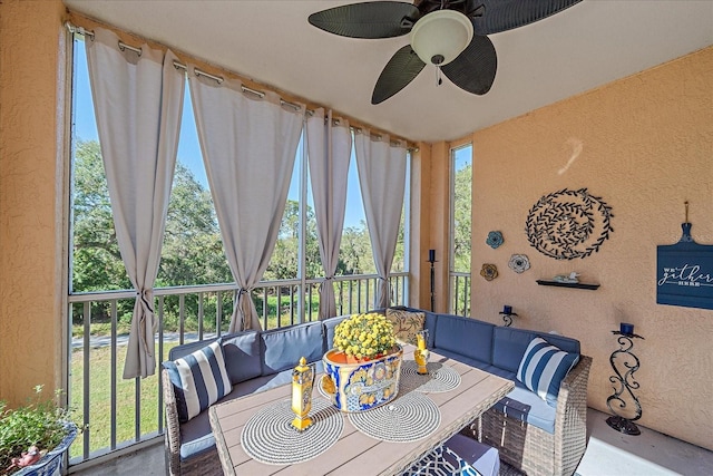 4106 Central Sarasota Pkwy Unit 1026, Sarasota, FL 34238 - sunroom / solarium featuring a ceiling fan and an outdoor hangout area