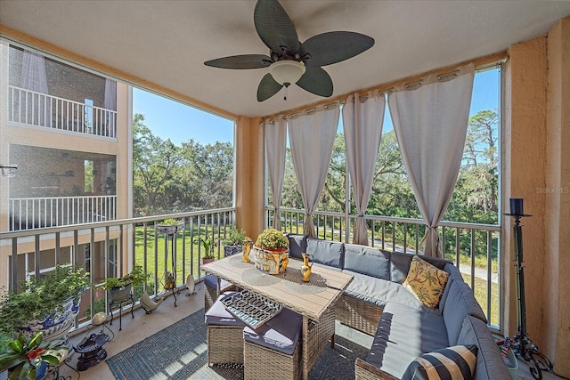 4106 Central Sarasota Pkwy Unit 1026, Sarasota, FL 34238 - sunroom / solarium with ceiling fan, an outdoor hangout area, and plenty of natural light