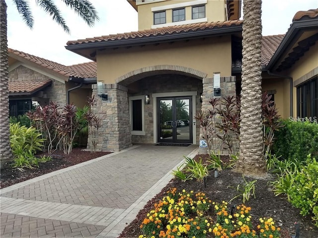 doorway to property featuring french doors