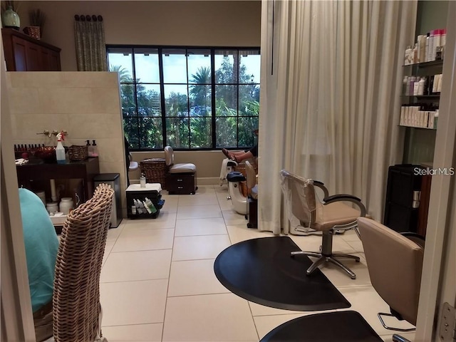 living area with light tile patterned floors