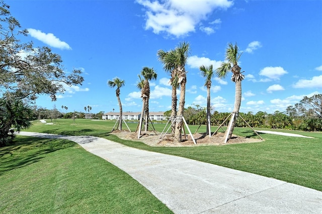 view of playground featuring a lawn