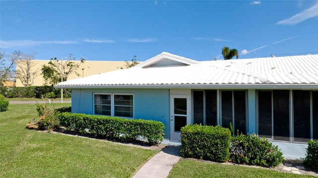 exterior space with a front yard