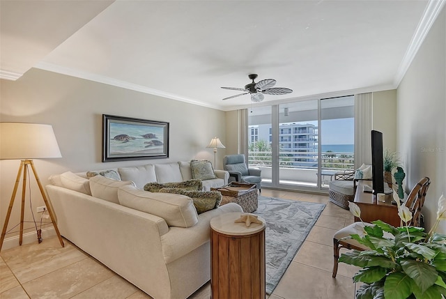 living room featuring light tile patterned floors, ceiling fan, and ornamental molding