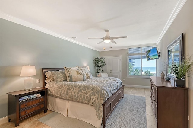 bedroom featuring ceiling fan, crown molding, and light tile patterned floors