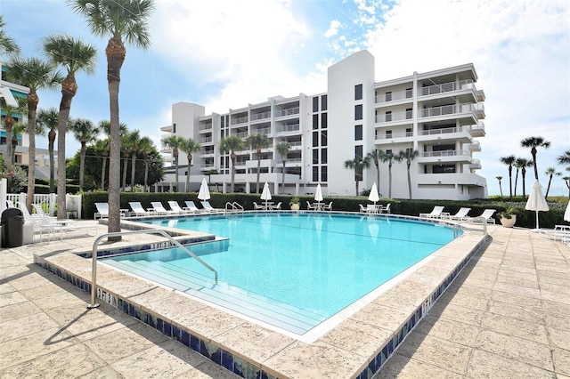 view of swimming pool featuring a patio